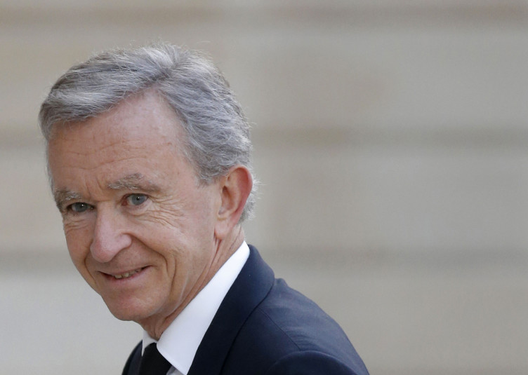 LVMH Chief Executive Bernard Arnault arrives to attend a dinner at the Elysee Palace in Paris