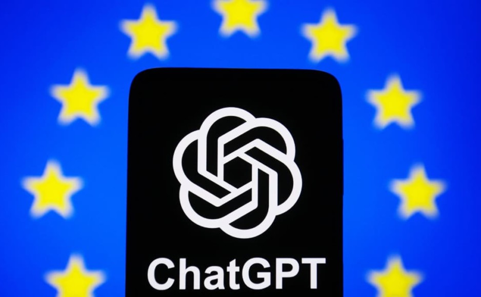 Écran affichant l'interface de ChatGPT avec le drapeau de l'Union européenne en arrière-plan